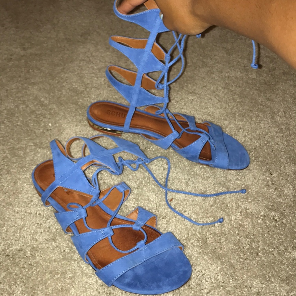 Schultz Midcalf gladiator sandals.